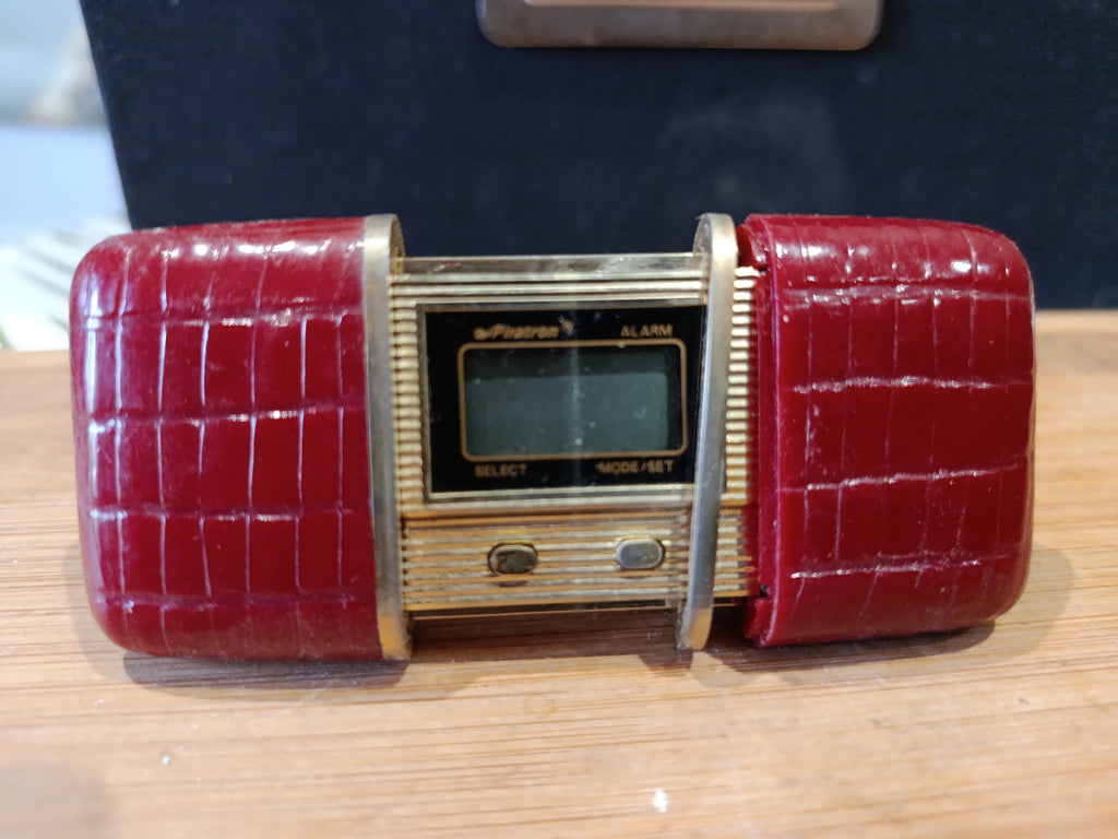 Mini réveil de poche vintage en métal doré Piratron alarme collector années 70-90