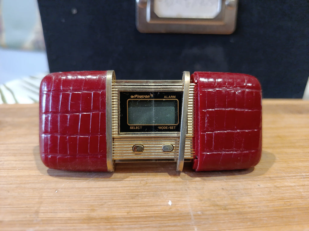 Mini réveil de poche vintage en métal doré Piratron alarme collector années 70-90