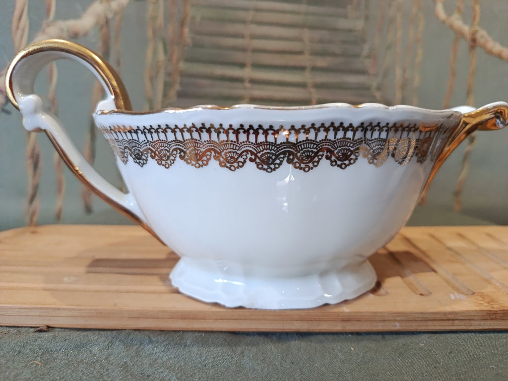 Saucère ancienne en porcelaine dorée Signée XIXe siècle Napoléon