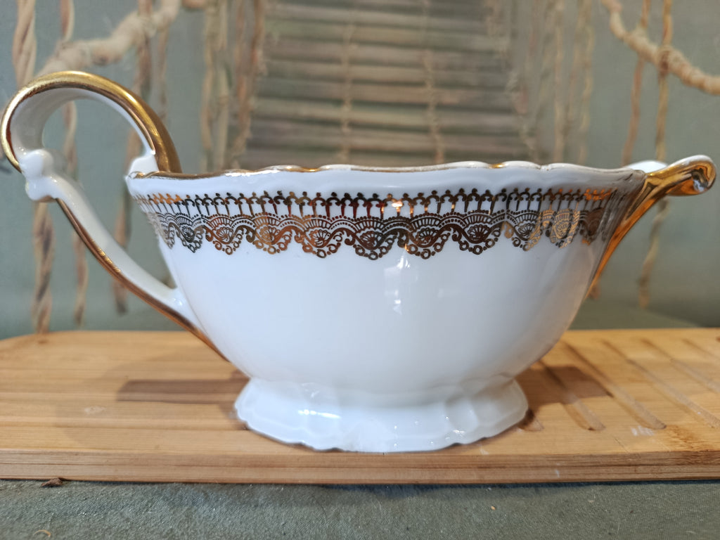 Saucère ancienne en porcelaine dorée Signée XIXe siècle Napoléon