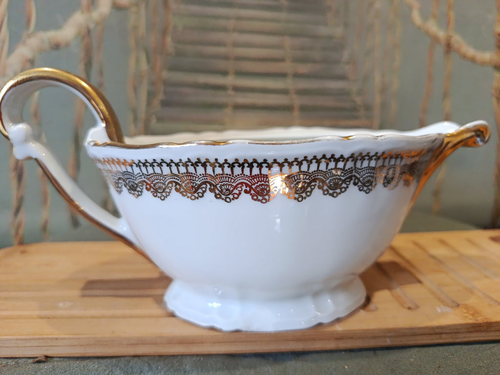 Saucère ancienne en porcelaine dorée Signée XIXe siècle Napoléon